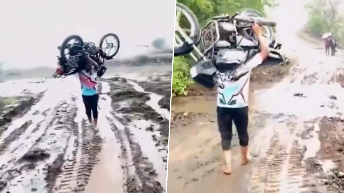 पावसामुळे रस्ता गेला चिखलात, तरूणाने दुचाकी थेट खांद्यावर घेत गाठला मार्ग ; सातारामधील व्हिडीओ वायरल (Watch Video)