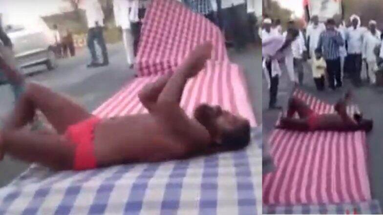 महाराष्ट्रावरील दुष्काळाचे सावट हटावे म्हणून भगवान महाराजांचे 127 किमीचे लोटांगण (Video) महाराष्ट्रावरील दुष्काळाचे सावट हटावे म्हणून भगवान महाराजांचे 127 किमीचे लोटांगण (Video)