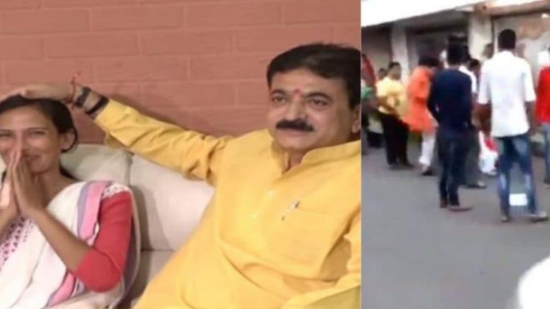 गुजरात BJP आमदाराने आधी लाथा मारलेल्या महिलेकडून बांधून घेतली राखी गुजरात BJP आमदाराने आधी लाथा मारलेल्या महिलेकडून बांधून घेतली राखी