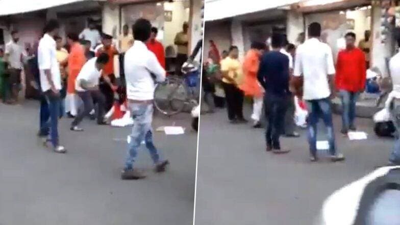 गुजरात मध्ये BJP आमदाराची गुंडशाही, भर रस्त्यात महिलेला लाथा बुक्क्यांनी केली मारहाण (Watch Video) गुजरात मध्ये BJP आमदाराची गुंडशाही, भर रस्त्यात महिलेला लाथा बुक्क्यांनी केली मारहाण (Watch Video)