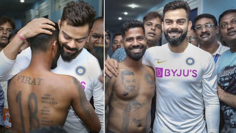 IND vs SA 1st Test 2019: पहिल्या टेस्टआधी विराट कोहली ने घेतली खास चाहत्यांची भेट, अंगावर गोंदवले कोहलीसंबंधीचे 15 टॅटू IND vs SA 1st Test 2019: पहिल्या टेस्टआधी विराट कोहली ने घेतली खास चाहत्यांची भेट, अंगावर गोंदवले कोहलीसंबंधीचे 15 टॅटू