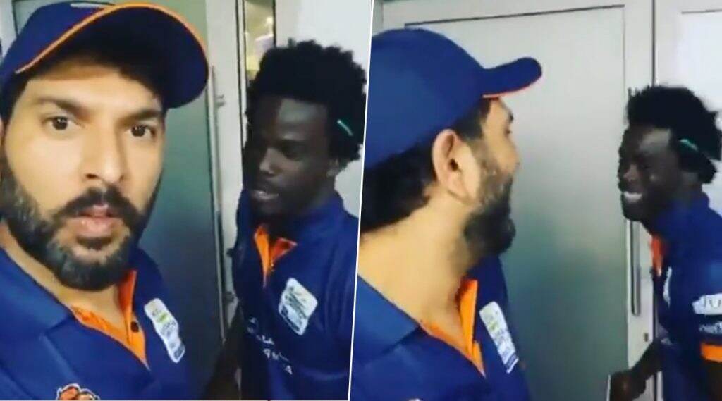 T10 League 2019: वेस्ट इंडियन चाडविक वॉल्टन याची पंजाबी ऐकून युवराज सिंह याला झाले हसू अनावर, पाहा हा मजेदार Video T10 League 2019: वेस्ट इंडियन चाडविक वॉल्टन याची पंजाबी ऐकून युवराज सिंह याला झाले हसू अनावर, पाहा हा मजेदार Video