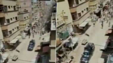 पाकिस्तान: लॉक डाऊन दरम्यान नमाज पठणासाठी एकत्र जमण्यास नाकारल्याने पोलिसांच्या गाडीवर दगडफेक; 7 जणांना अटक (Watch Video)