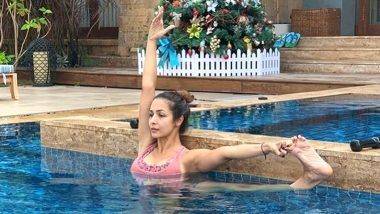 Malaika Arora Hot Photo: स्विमिंग पूल मध्ये योगा करताना दिसली मलायका अरोरा, फोटो पाहून तुम्हीही व्हाल थक्क