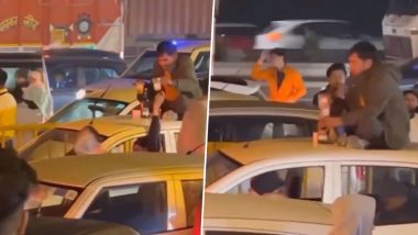 Viral: कारच्या छतावर बसून मद्यप्राशन करणाऱ्या व्यक्तीचा व्हिडिओ व्हायरल, पाहा
