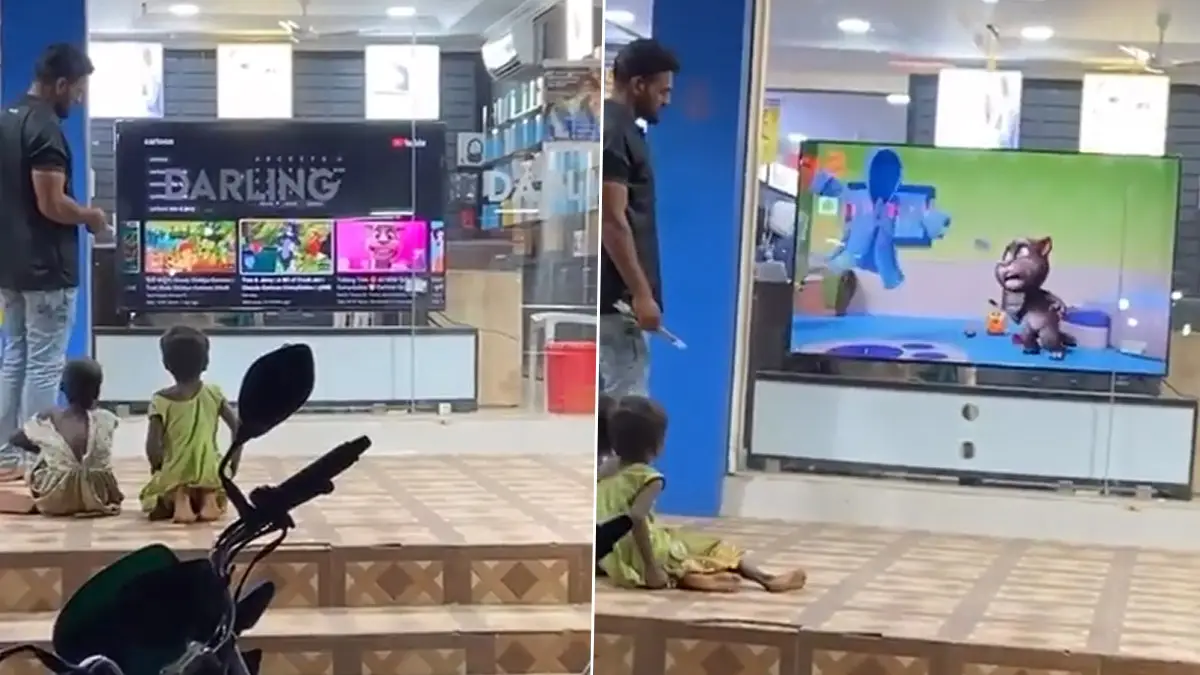 Viral Video: दुकानाबाहेर उभे असलेल्या बेघर मुलांसाठी टिव्हीवर लावला कार्टून शो, सेल्समनने जिंकली नेटकऱ्यांची मने, पहा व्हिडिओ