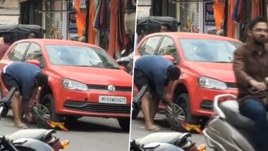 Ratlam: पोलिसांनी कारच्या चाकाला लावला लॉक, चालकाने चाक बदलून घेऊन गेला गाडी (Watch Video)