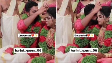 Groom Kissing Bride Cute Video: वराने लग्नाचे विधी चालू असताना सर्वांसमोर घेतले वधूचे चुंबन; सोशल मिडियावर व्हिडिओ व्हायरल, Watch