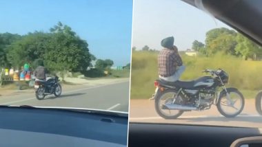 Viral Video: चालत्या गाडीवर एका व्यक्तीने केला जीवघेणा स्टंट, व्हिडीओ व्हायरल