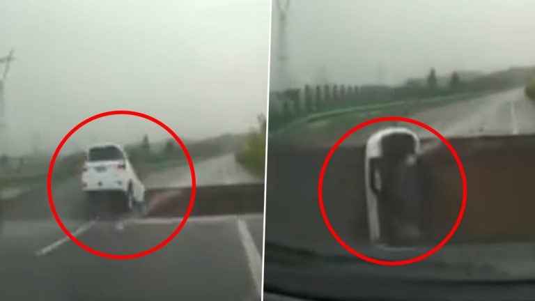 Viral Video: चीनमध्ये मुसळधार पाऊस! भरधाव वेगात आलेली SUV कोसळली खड्ड्यात, Watch