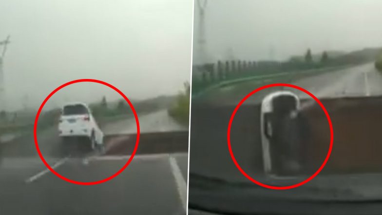 Viral Video: चीनमध्ये मुसळधार पाऊस! भरधाव वेगात आलेली SUV कोसळली खड्ड्यात, Watch