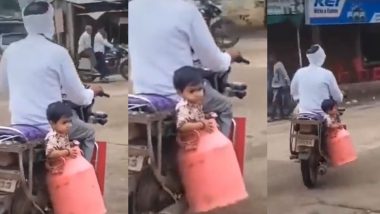 VIDEO: देसी जुगाड! दुचाकीवरून प्रवास करताना लहान मुलाला बसवले दुधाच्या डब्यात; सोशल मिडियावर व्हिडिओ व्हायरल