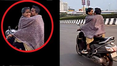 Couple Romance On Bike Video: चालत्या दुचाकीवर पांघरुनाआडून चाळे, पोलिसांकडून युगुलावर कारवाई (Watch)