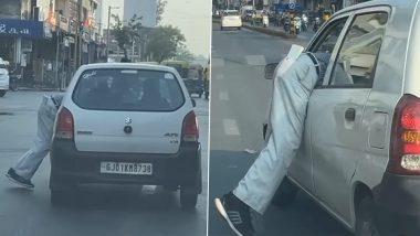 Video- Car Driver Drags Man Into Car: पार्किंगचे शुल्क मागितल्यावर चालकाने जे केले ते पाहून बसेल धक्का, व्हिडीओ व्हायरल