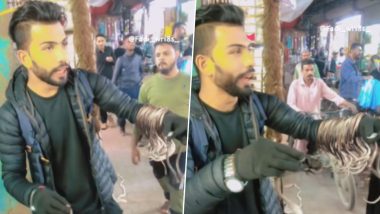 Snakes Viral Video: 'आस्तीन के सांप ले लो...' हातात डझनभर साप लटकवून विकताना दिसला 'हा' व्यक्ती, पहा व्हिडिओ